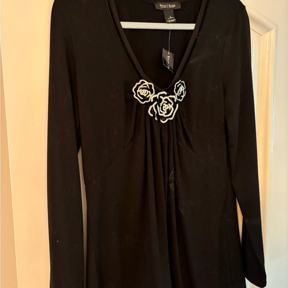 White House Black Market Sweaters - NWT White House Black Market black tunic with rose/camelia detail